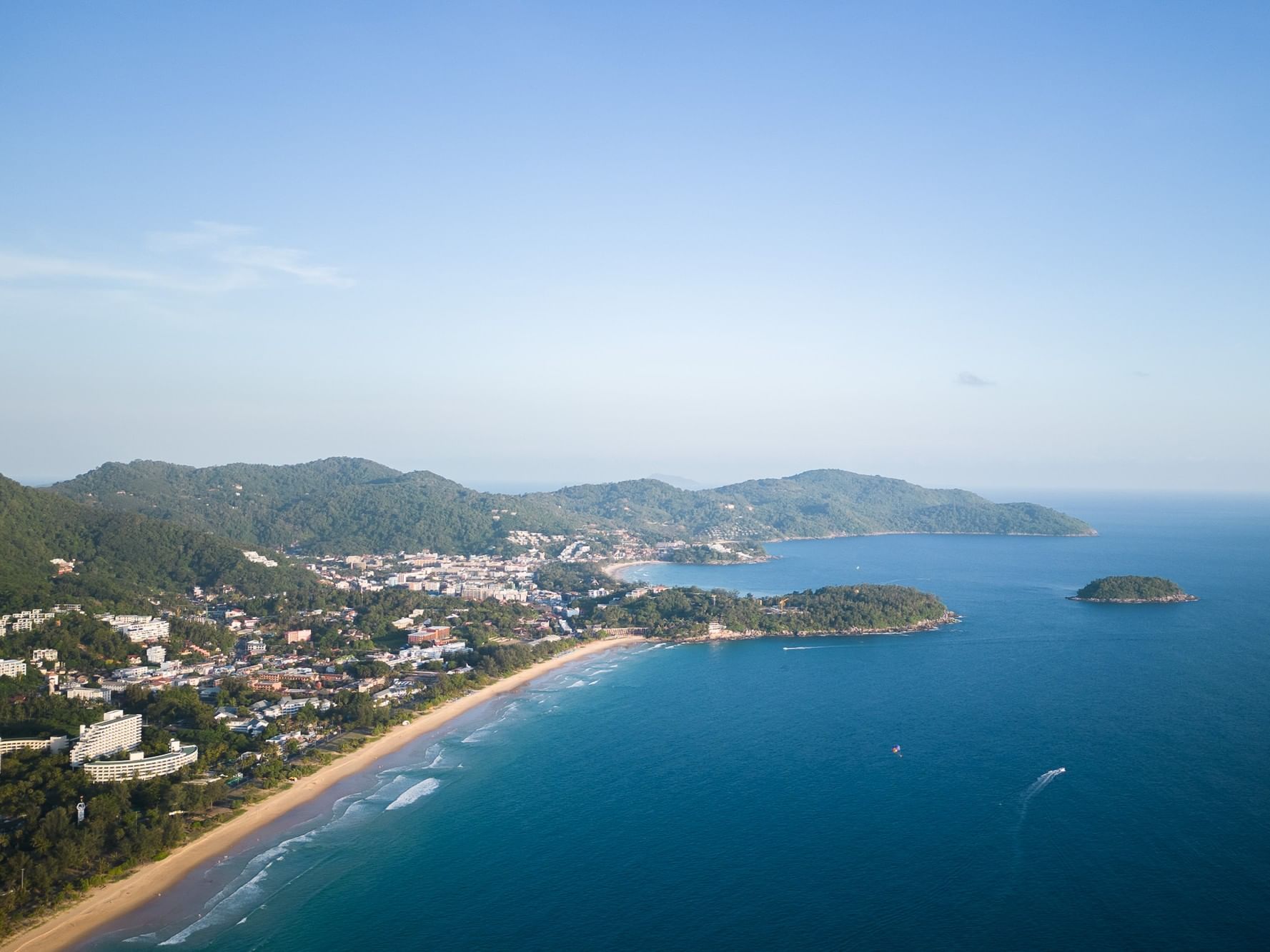 Aerial bird’s-eye view of Karon and Kata Beaches in Phuket with turquoise sea and sandy shoreline.