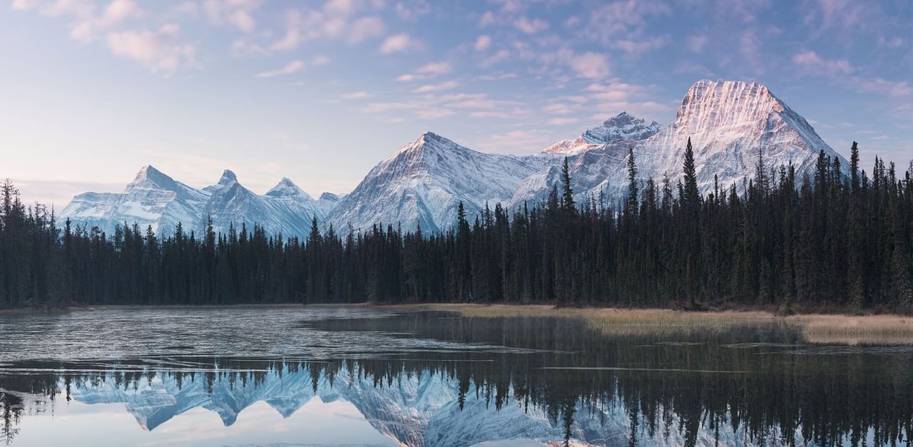 Landscape view of Rocky Mountains, Coast Hinton Hotel in winter