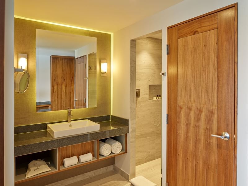 Deluxe room bathroom vanity & toiletries, La Colección Resorts