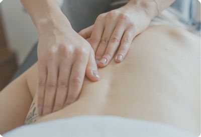 Woman receiving a massage in a spa at Recoleta Grand Hotel