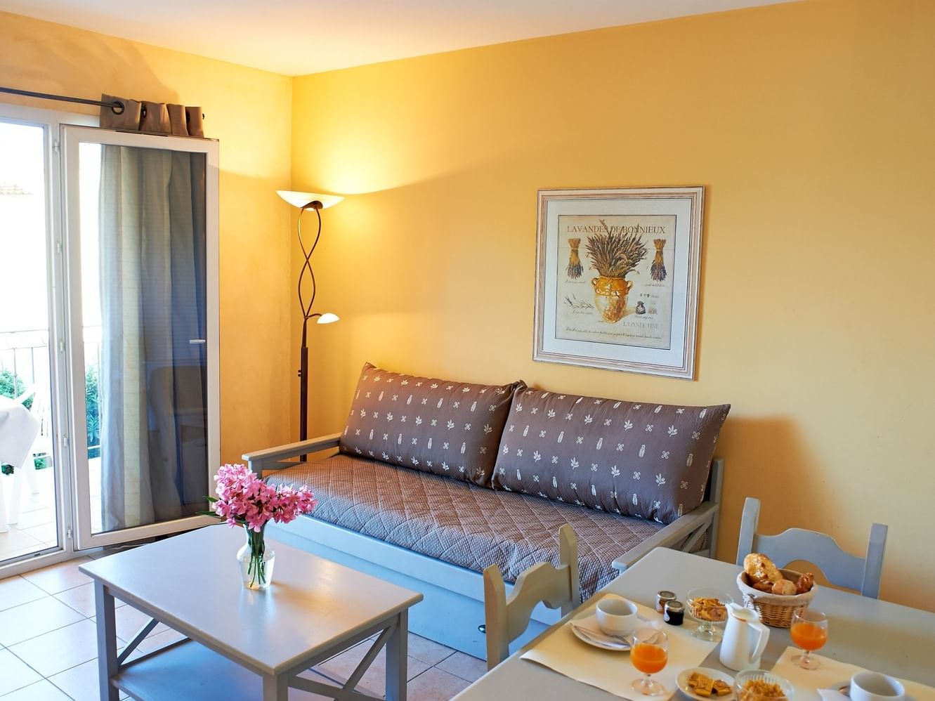 Living area with sofa bed and dining setup in Two-bedroom apartment 6 guests at ResidHotel Avignon Grand Avignon
