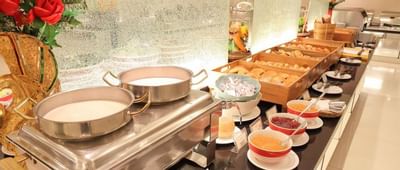 Bakery items in the buffet area at Amora Hotel Chiang Mai