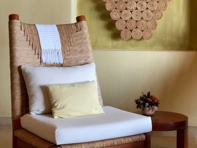 Lounge chair in Cliffside Ocean Front Suite at Cala de Mar