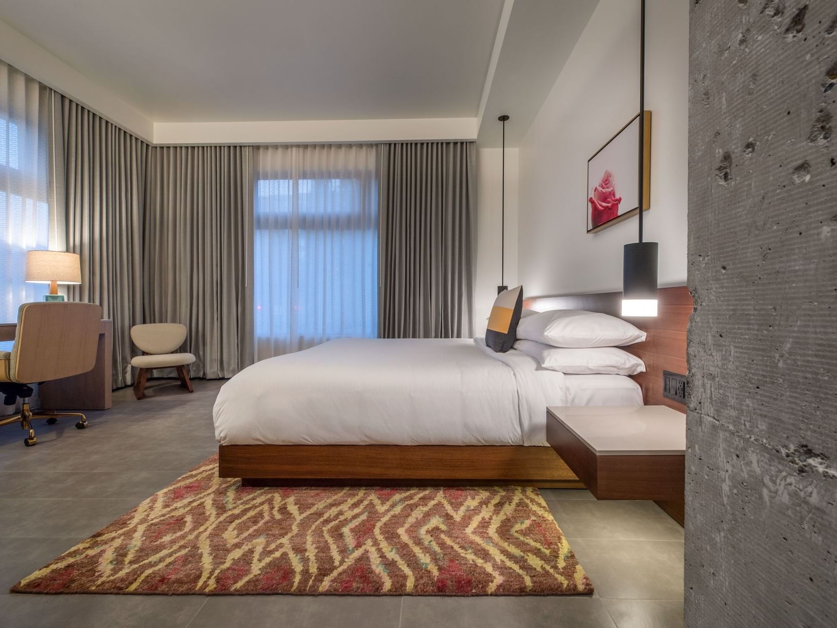 Hi-Lo hotel room with bed and desk