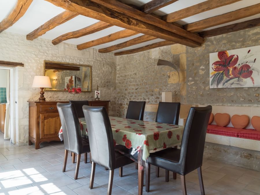 Dining tables set up in Le Relais de Saint-Preuil
