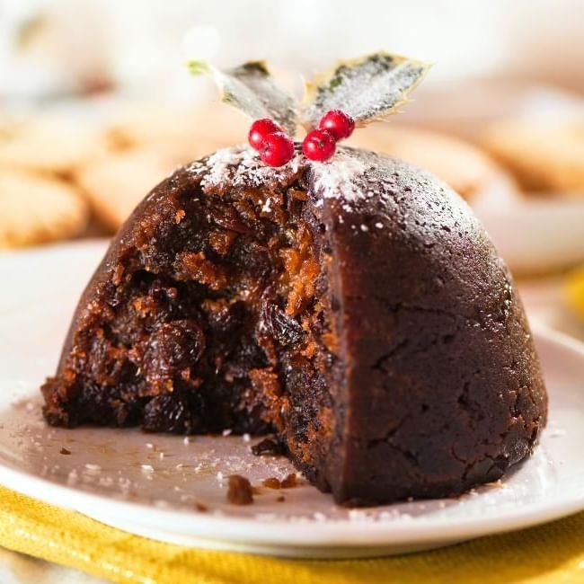 Christmas pudding cut and ready to eat featuring our article on 