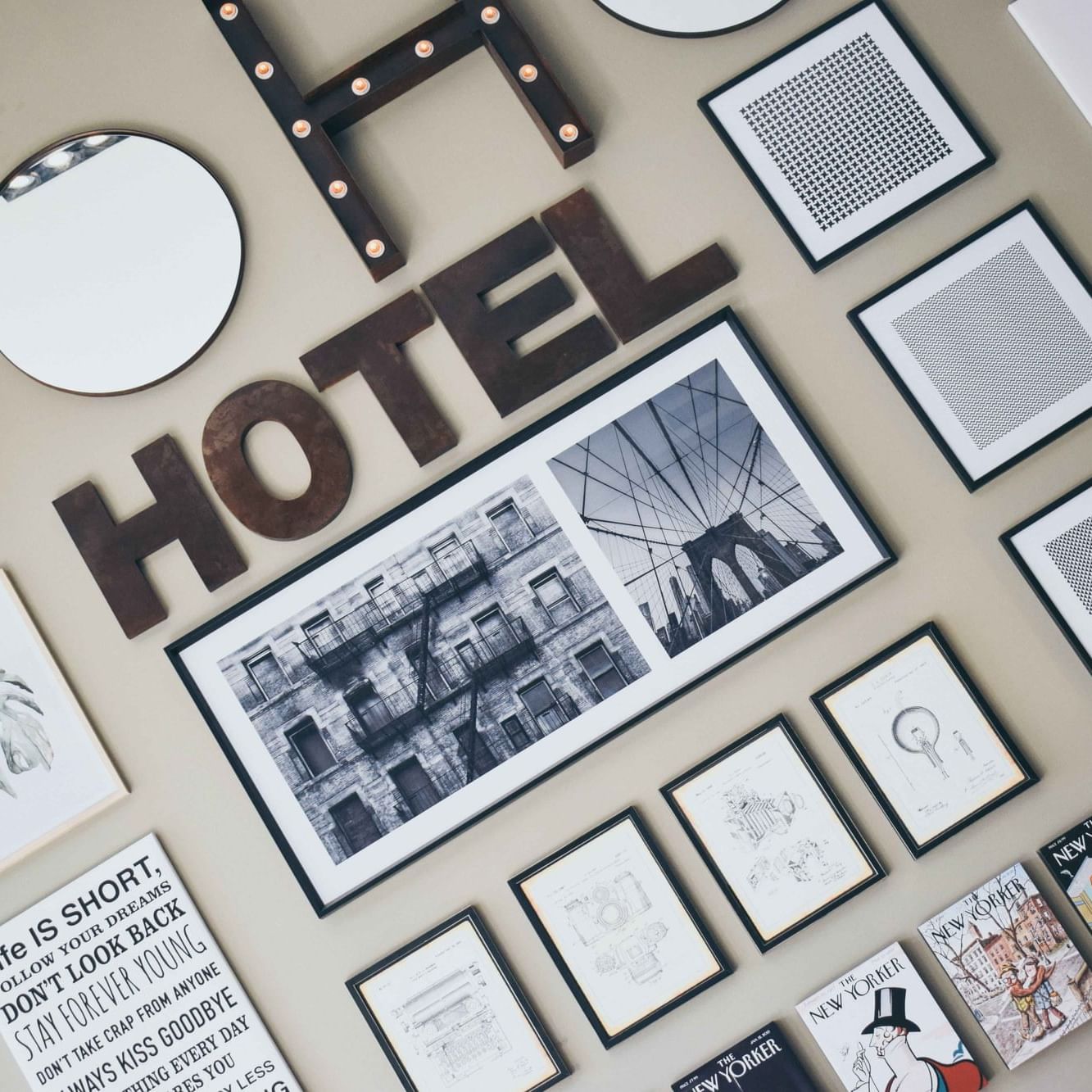 Wall with framed articles at Cyan Soho Neuquen Hotel