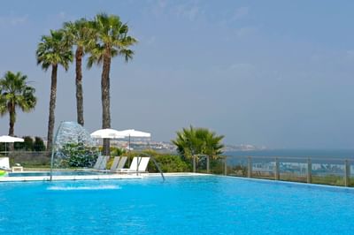 Outdoor pool facing the sea at Hotel Cascais Miragem Health & Spa