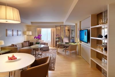Modern living room with interior & decor in Executive Suite with wooden floors at One World Hotel