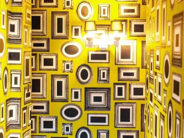 Artful yellow pop art hallways of the Moderne Hotel NYC