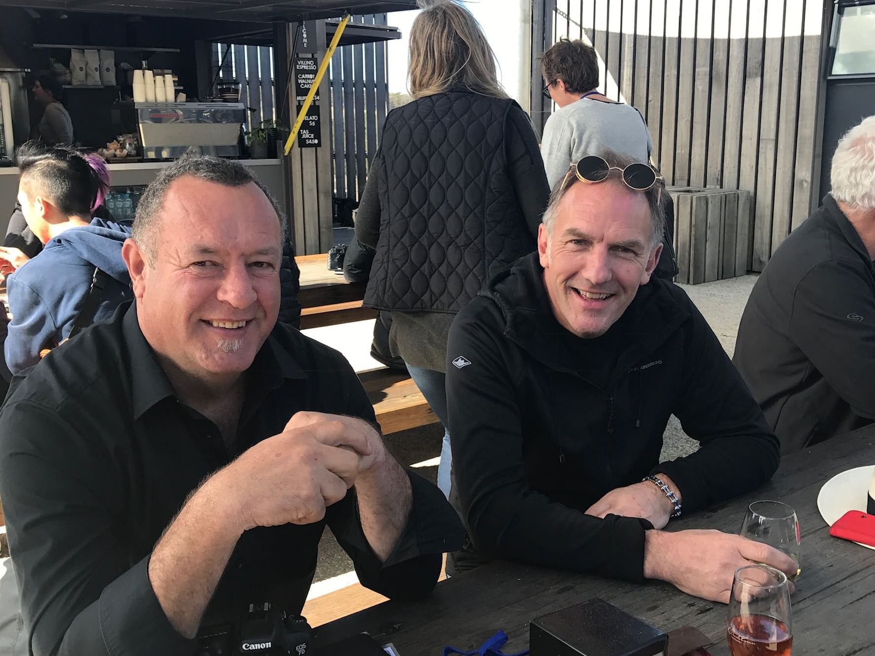 Two men posing in the Great Eastern Wine Weekend at Freycinet Lodge