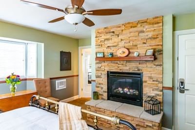 j patrick house fireplace bedroom