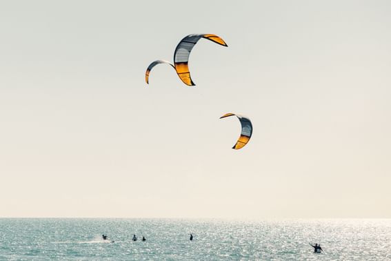 Tourists kiteboarding near H2O Life Style Resort