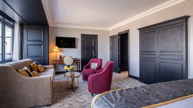 TV lounge area & work desk by the bed in Junior Suite at Hotel Barsey by Warwick - Brussels
