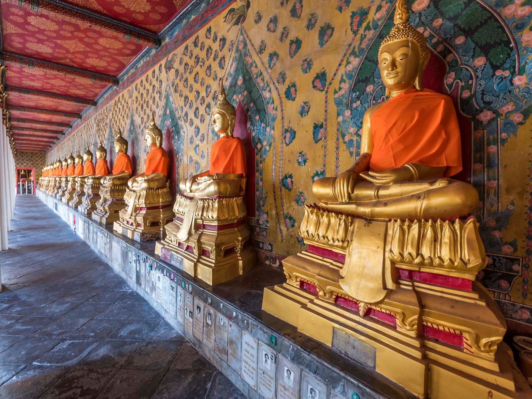 Idols of Lord Buddha at Wat Arun near Chatrium Residence Sathon