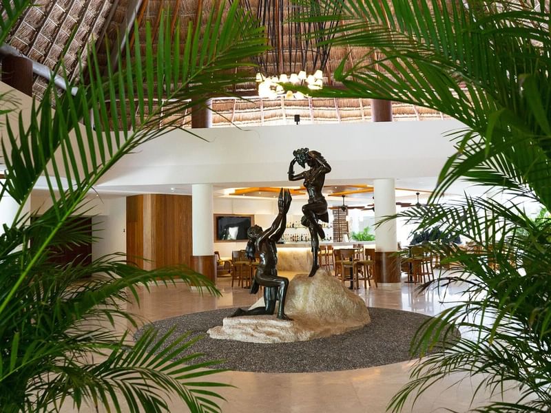 Unique statue in lobby area at The Reef coco Beach Hotel 