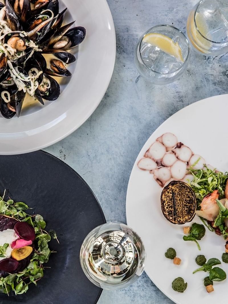 Close-up on plated dishes served at Crown Hotel Perth