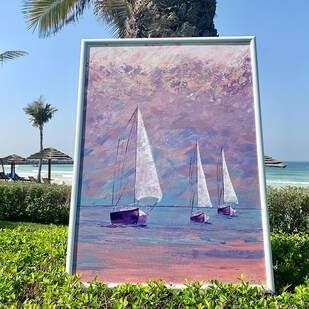 A sailing ship photo in an exhibition at Ajman Hotel