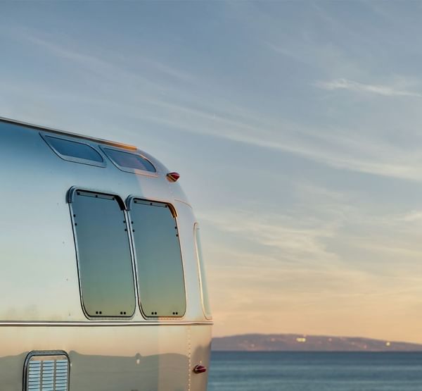 A caravan stopped by the beach near Falkensteiner Premium Camping Zadar