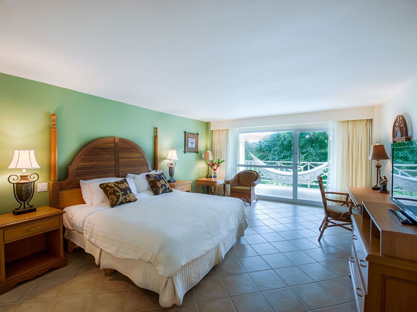 Comfy bed in Deluxe Garden View Room at Gamboa Resort