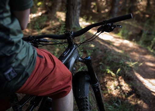 person sitting on a Mountain Bike