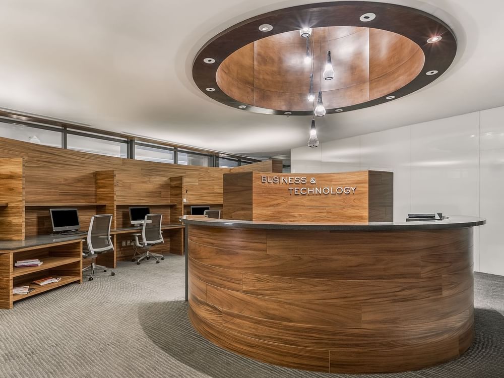 Counter in the Business Center & computers with office chairs at Live Aqua Resorts and Residence Club