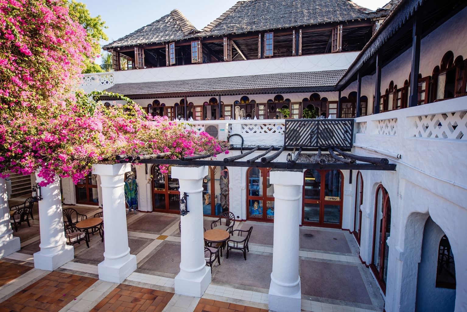 Exterior view with Bougainvillea at Serena Beach Resort & Spa 
