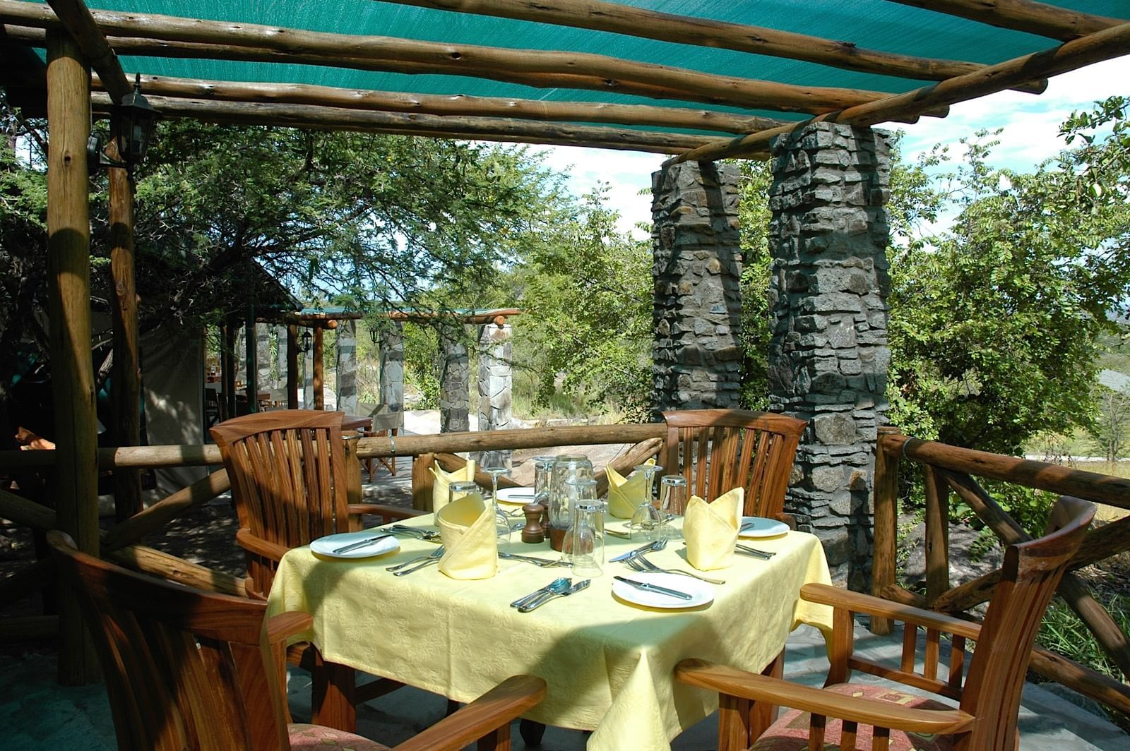 Dining table arranged for 4 at Mbuzi Mawe Serena Camp