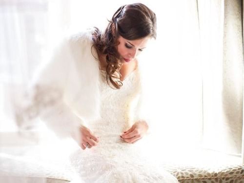 A bride, getting ready for reception at Stein Eriksen Lodge