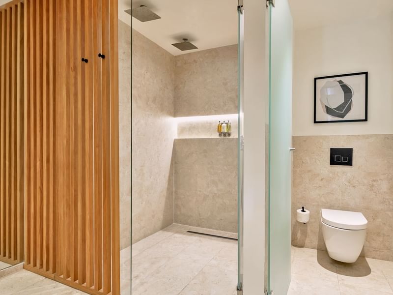 Bathroom interior & shower area in Tierra Suite at Live Aqua Resorts and Residence Club