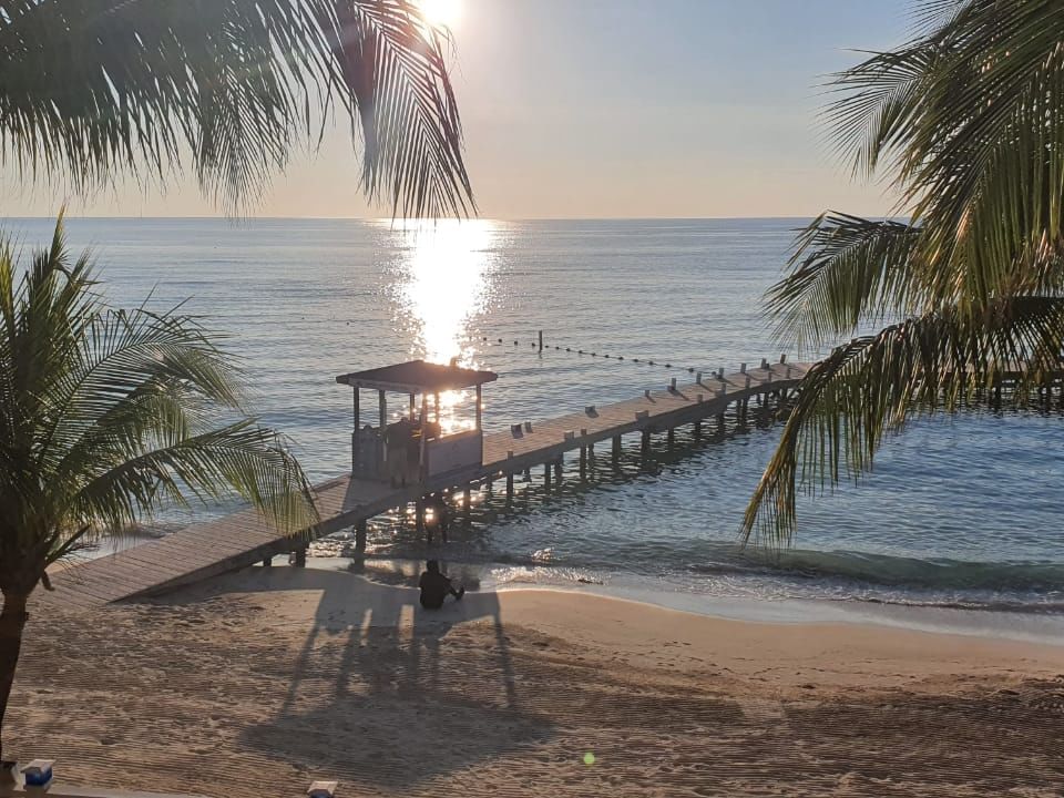 View of the pier from One-Bedroom Beachfront at Infinity Bay