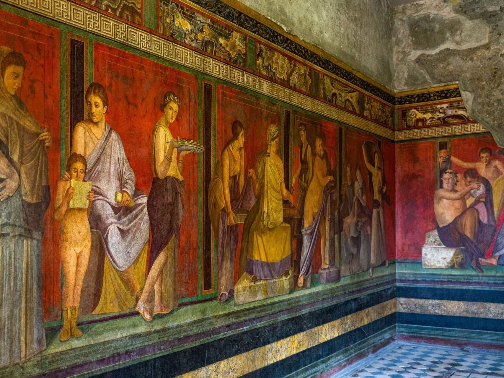 View of paintings on the wall in Villa of the Mysteries near The Independent