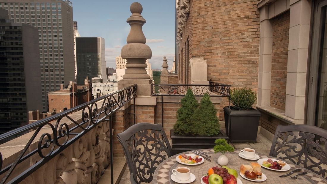 Breakfast served on the table, balcony in Suites with Terrace at Warwick New York