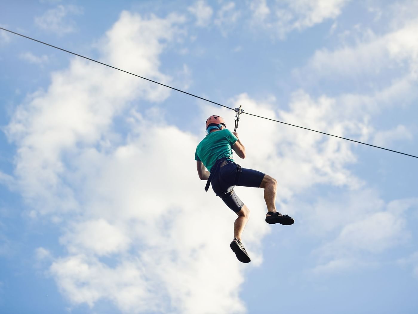 Zip sliding at Wild Canyon Adventures near La Colección