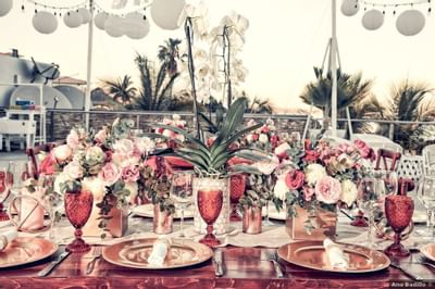 Floral table decorations at Cabo Villas Beach Resort