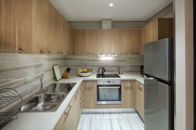 open concept kitchen with stove, oven and fridge
