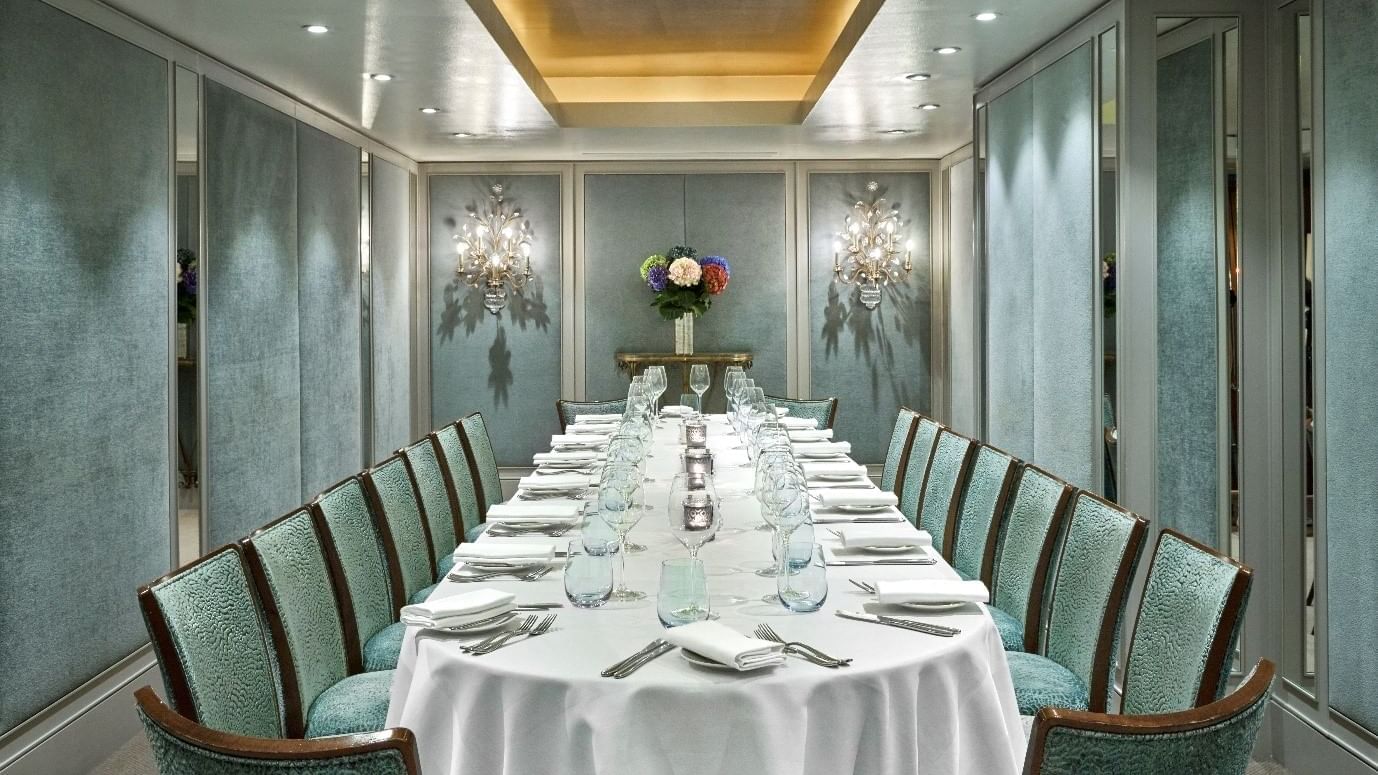 Private dining room at Warwick Hotels and Resorts, with an elegant table set for a formal banquet
