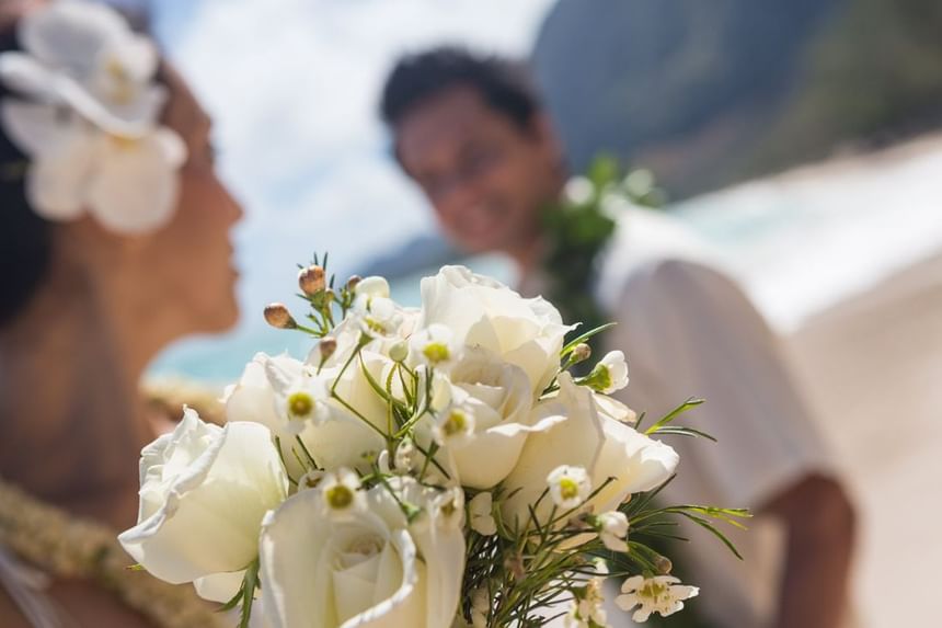 Close-up of the bride holding the bouquet at Paradise Bay Resort