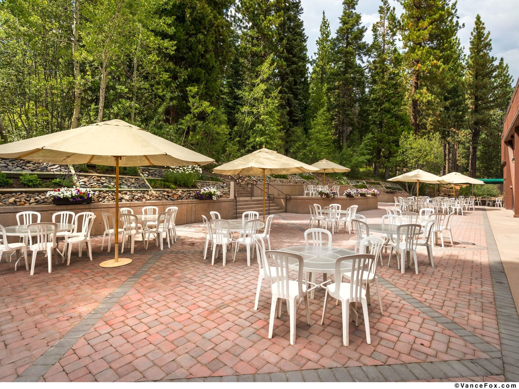 Outdoor dining table setup in garden at Granlibakken Tahoe