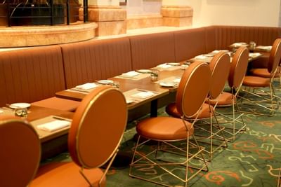 Dining area in Palm Court Lobby Lounge at Hanoi Daewoo Hotel