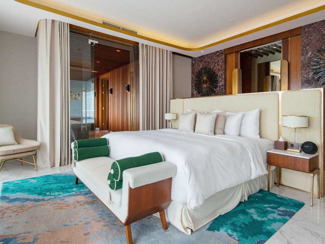 Comfy king bed in Presidential Suite at Vasa Hotel Surabaya