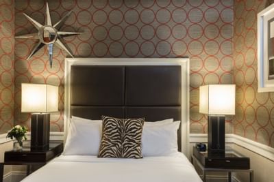 queen sized bed inside empire hotel nyc