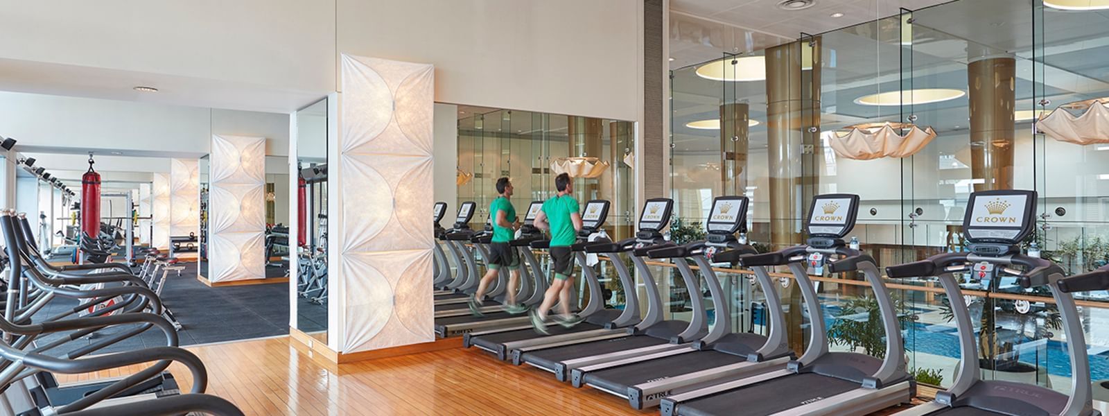 A man on a treadmill in the Gym at Crown Hotels
