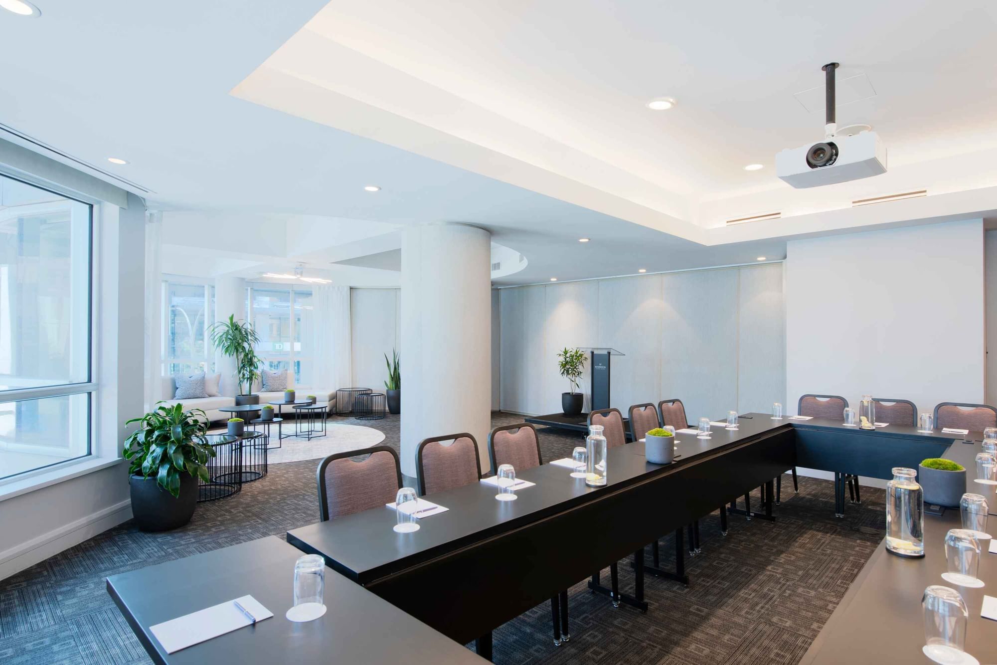Table set-up with carpeted flooring in Salon De La Montagne at Warwick Hotels and Resorts
