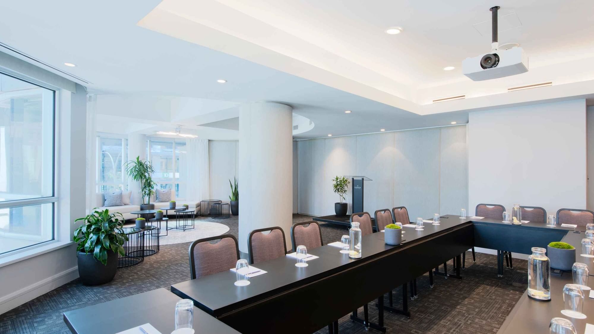 Table set-up with carpeted flooring in Salon De La Montagne at Warwick Hotels and Resorts