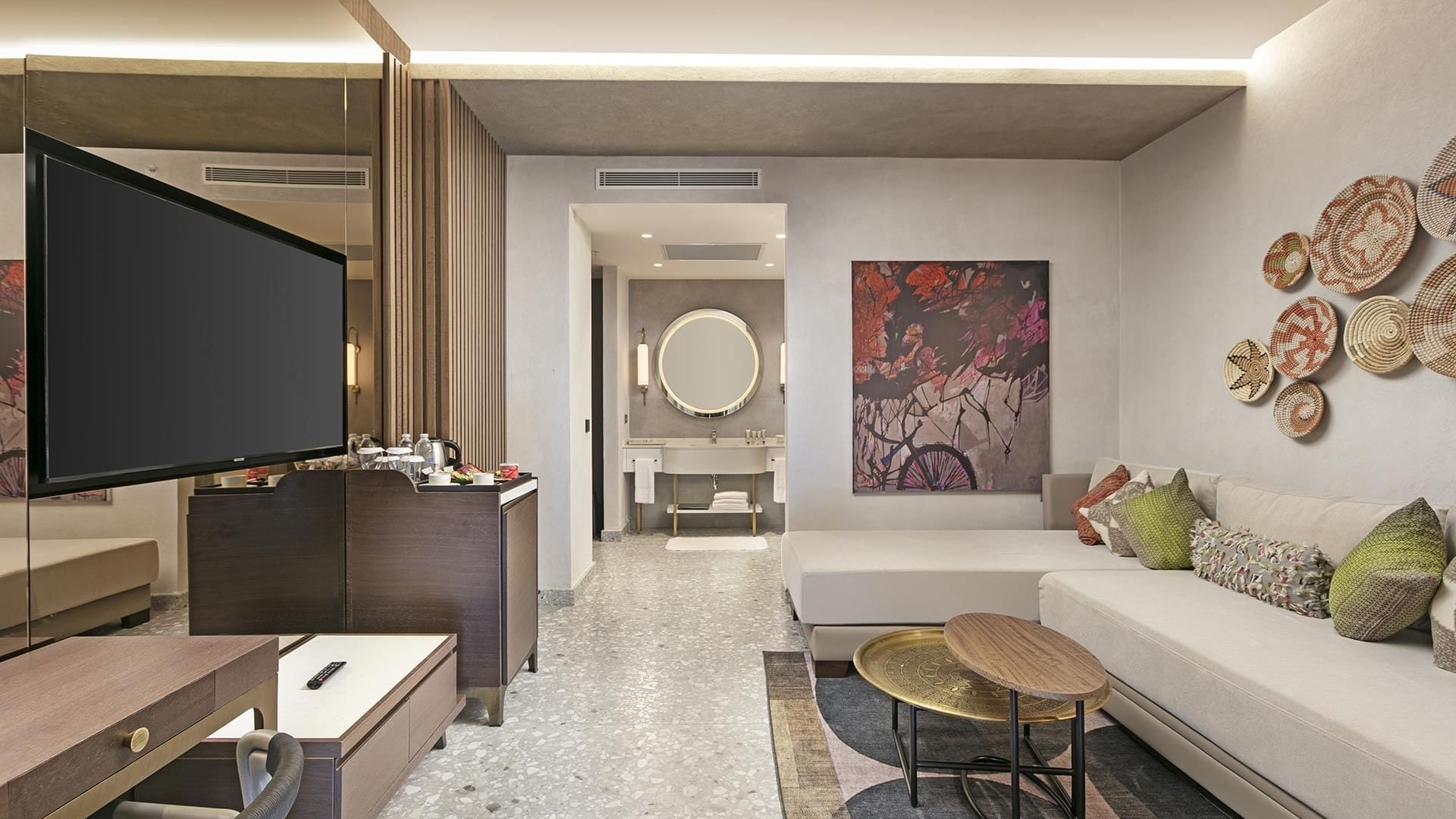 TV lounge area of Family Roof Suite with a cozy sofa & TV at Cullinan Belek