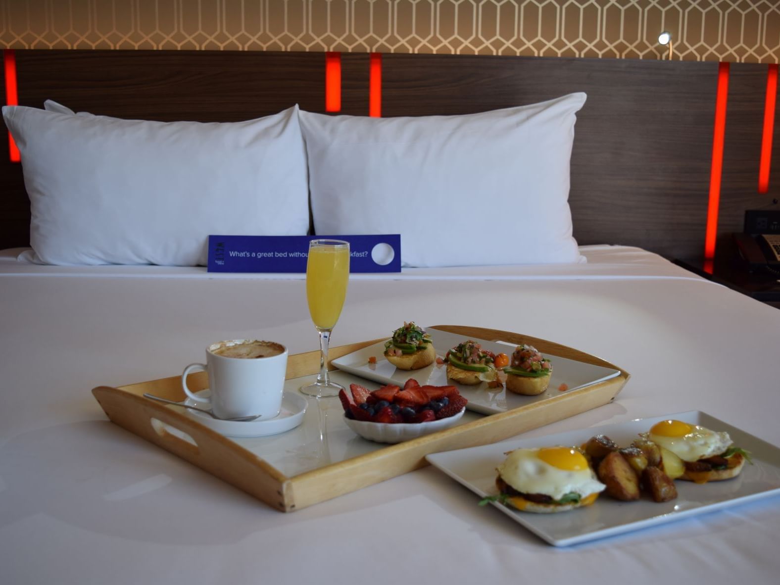 Breakfast in bed in a room at Hotel Angeleno