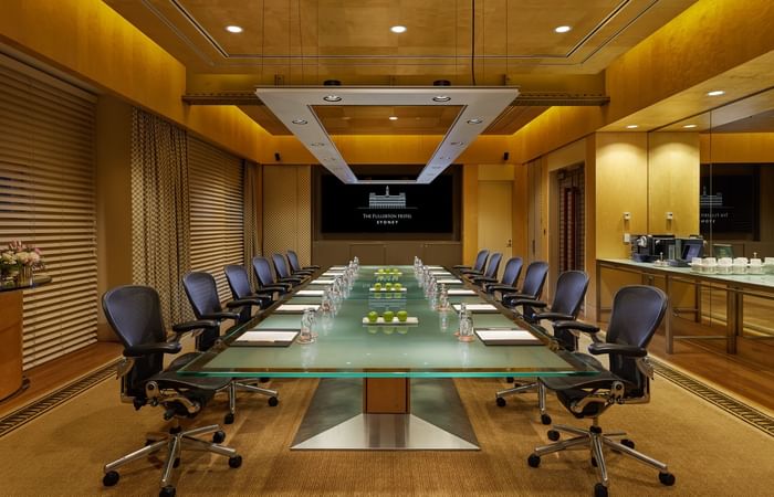 Conference room with a table and chairs in Heritage Executive Boardroom at Fullerton Sydney