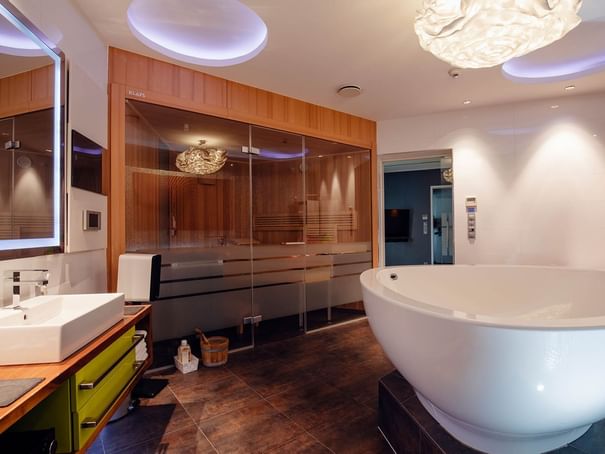 Bathroom with bathtub in Teufel Suite at Hotel Berlin Berlin