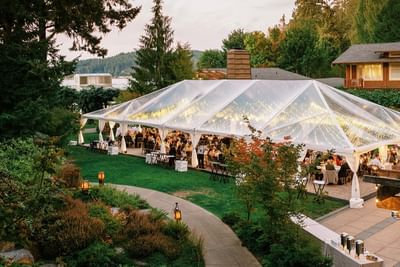 Illuminated tent in the Courtyard Lawn arranged for an event at Alderbrook Resort & Spa